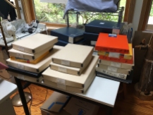 boxes of prints in studio
